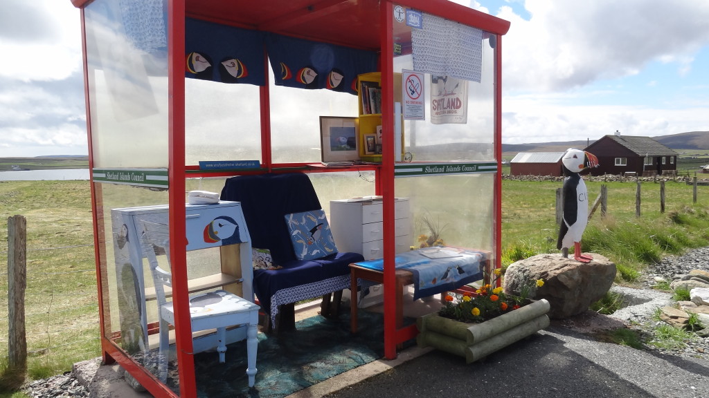 Bus shelter decorated with puffins