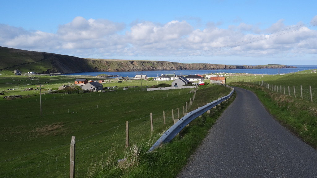 Village view, cliffs in the background