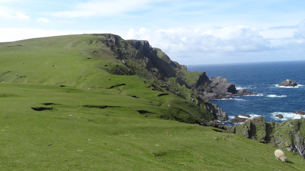 Rolling green hills and cliffs