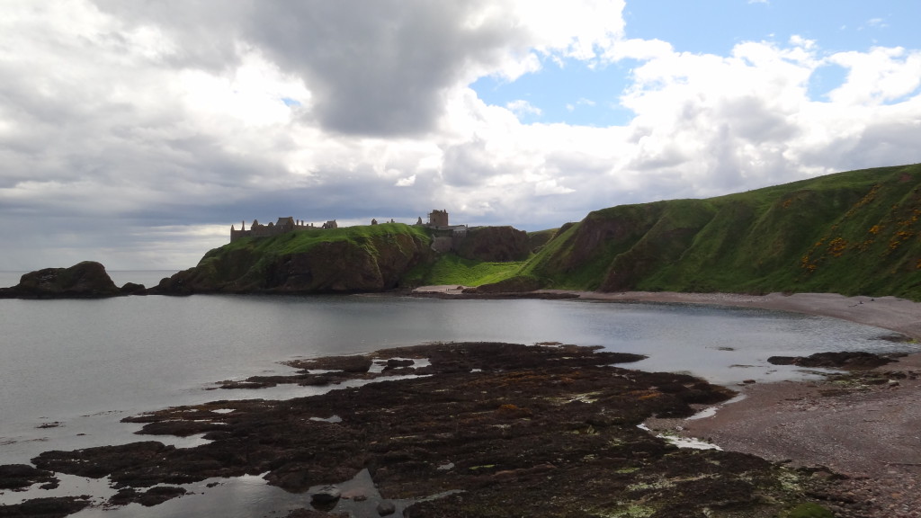 beach with Stonehaven castle in the background